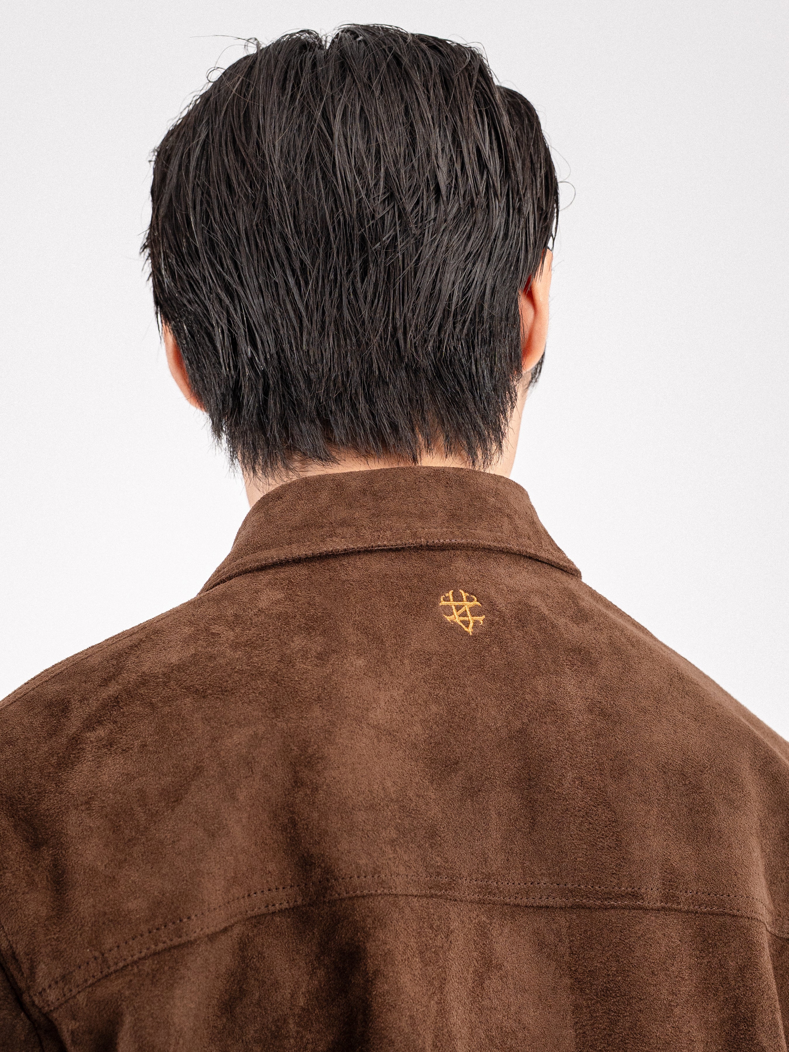 Brown suede men's shirt with gold logo, back view, stylish casual wear