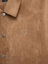Tan suede men's jacket with embroidered logo and branded buttons, stylish apparel for formal or casual wear