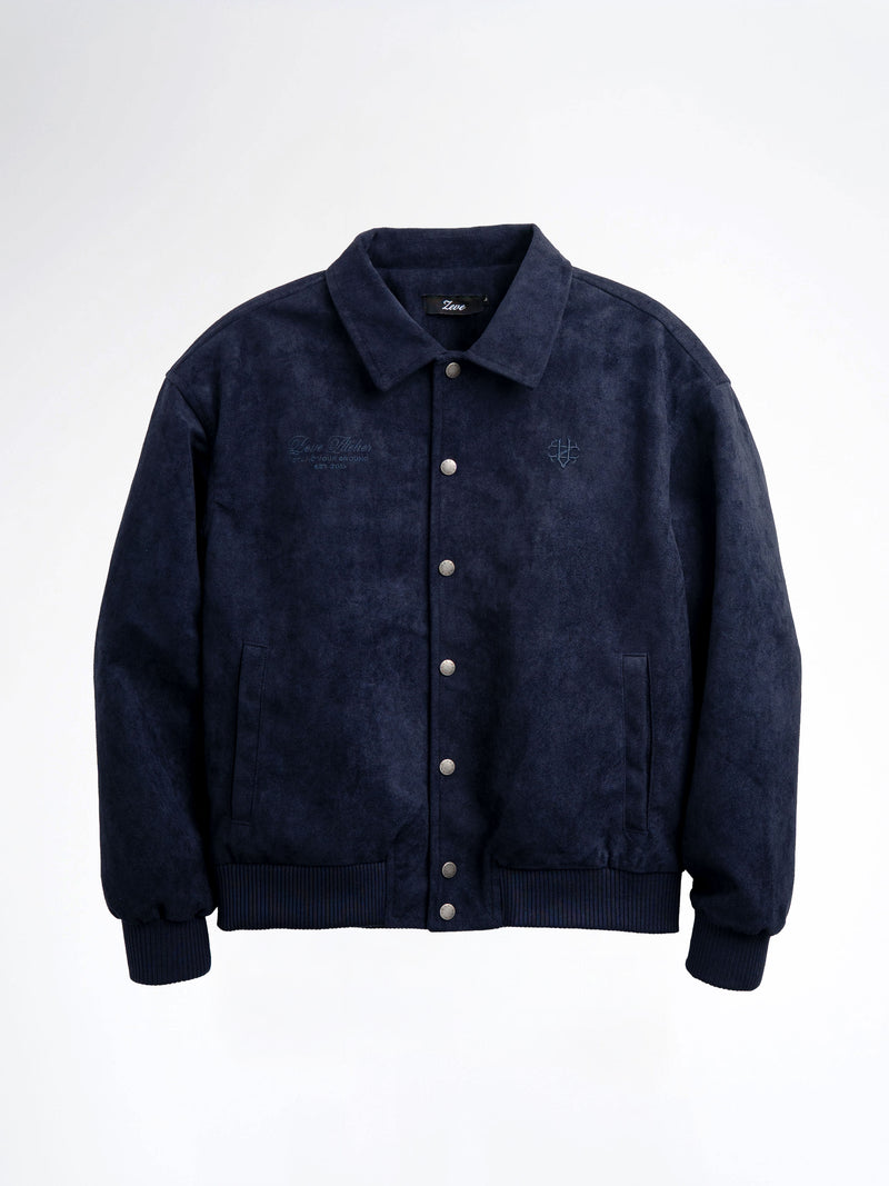 Navy blue men's suede bomber jacket with embroidered logo, button front, and ribbed cuffs for stylish casual wear.