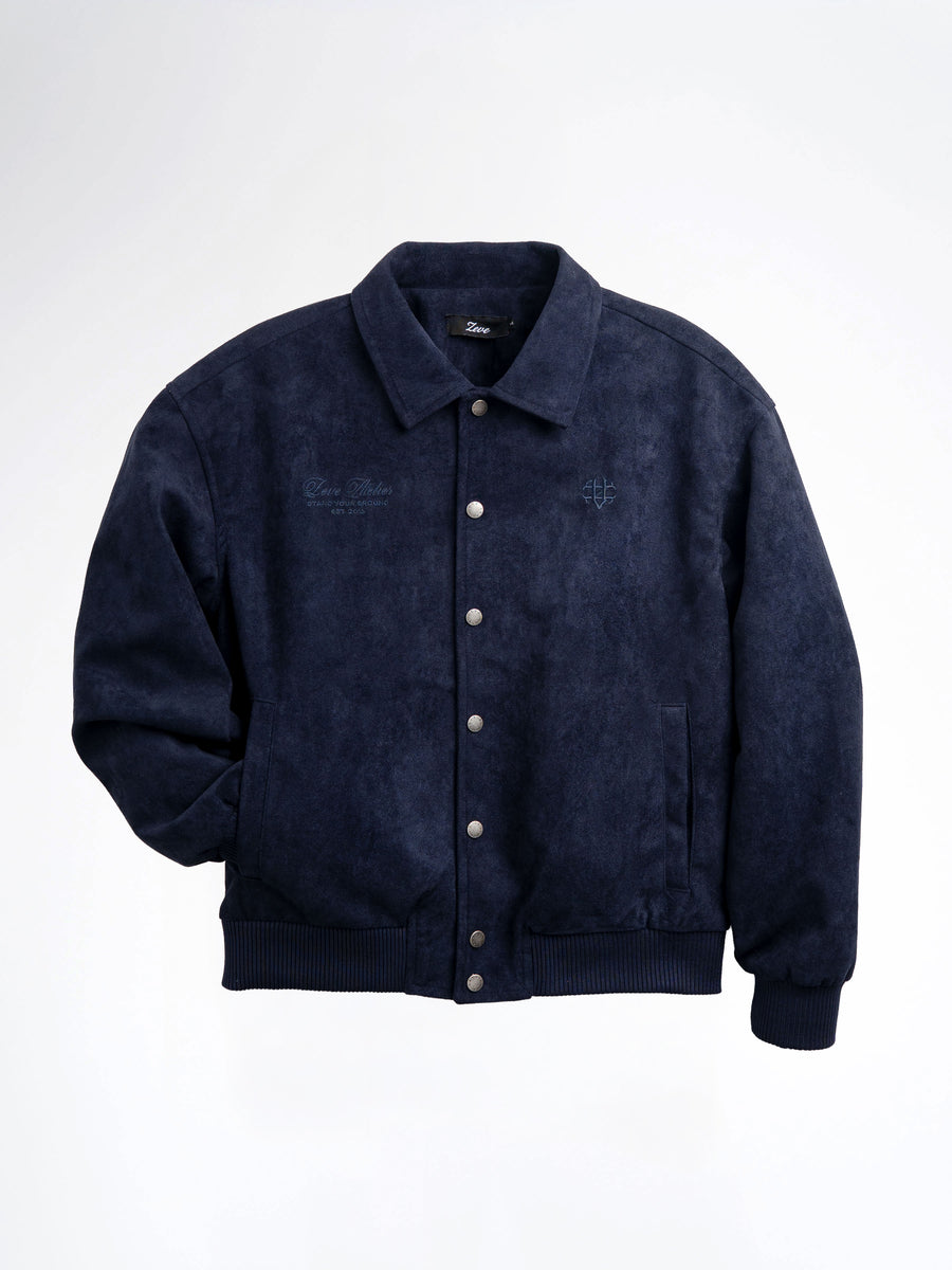 Navy blue men's suede bomber jacket with embroidered logo, button front, and ribbed cuffs for stylish casual wear.