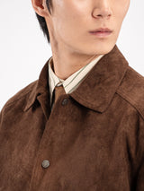Brown suede jacket with striped shirt and patterned tie for men's stylish apparel